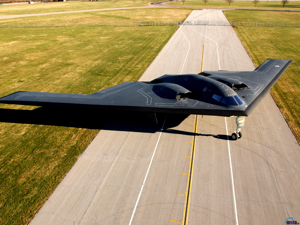 377.jpg - FILE PHOTO -- The B-2 Spirit is a multi-role bomber capable of delivering both conventional and nuclear munitions. The B-2 brings massive firepower to bear, in a short time, anywhere on the globe through previously impenetrable defenses. (U.S. Air Force photo)